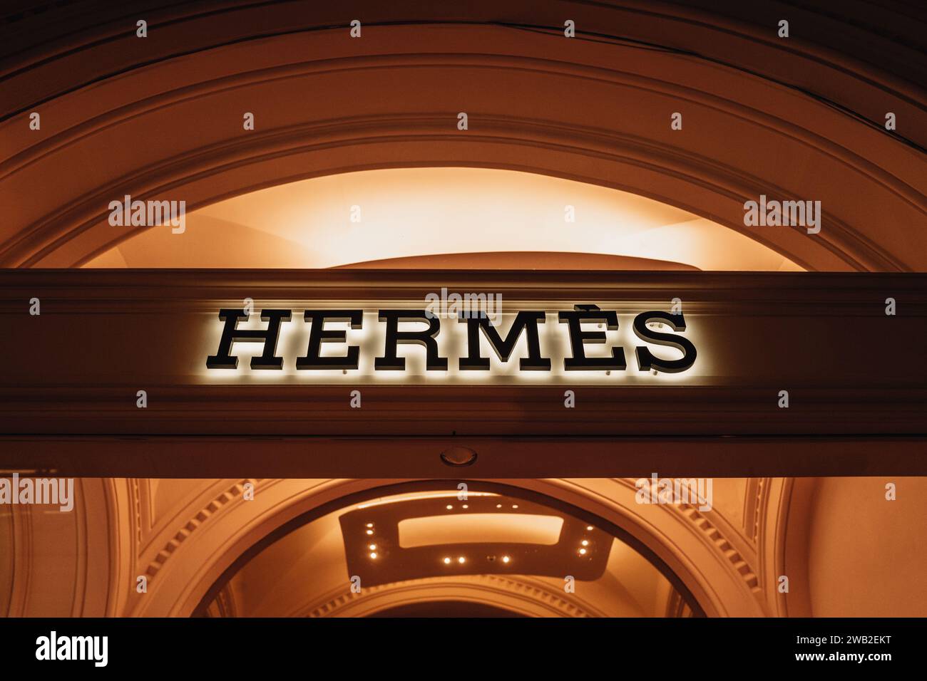 Famous Hermes store in a classy interior with luxury goods in shopping ...