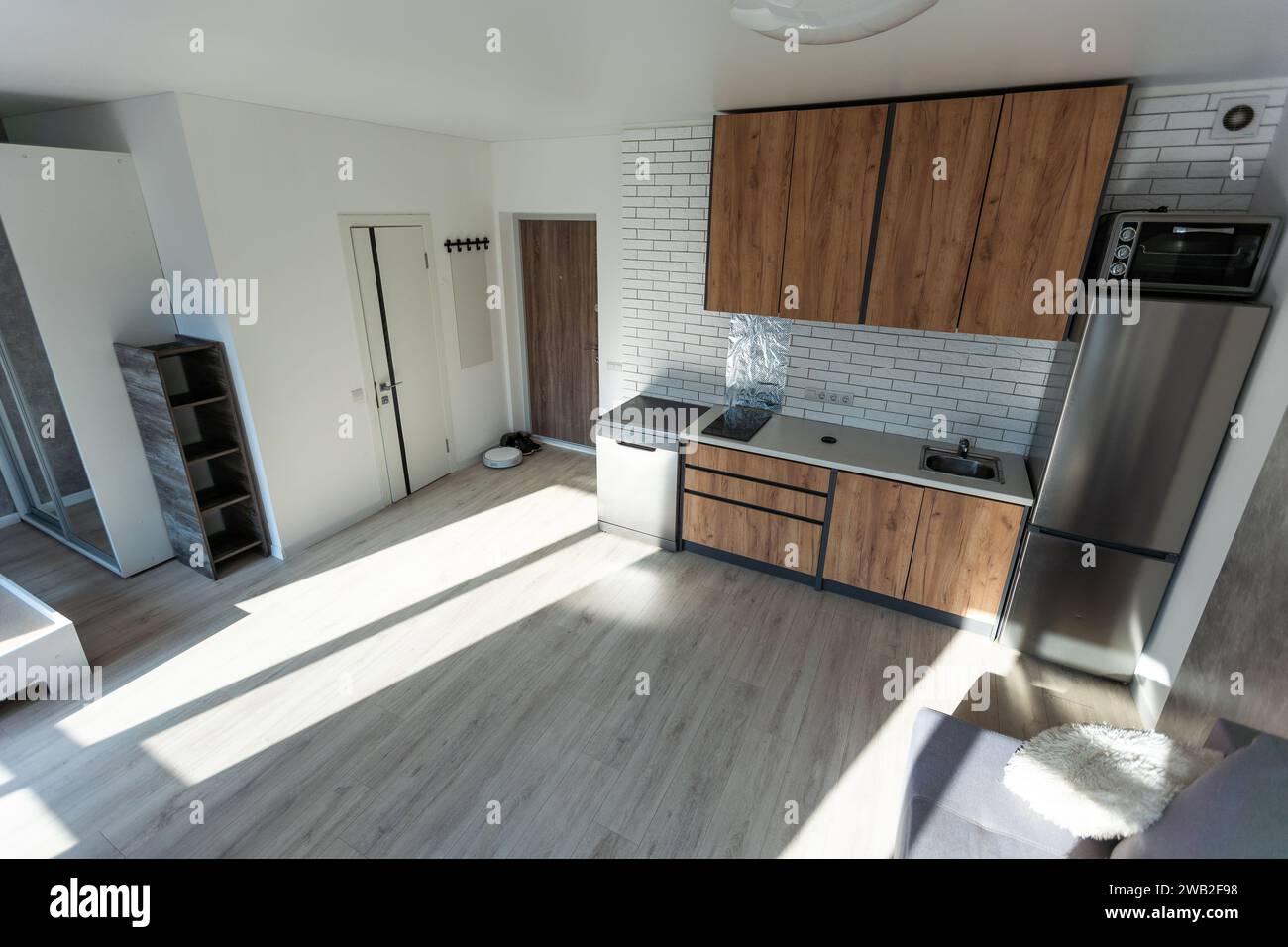 Clean kitchen in a small cozy contemporary studio apartment Stock Photo ...