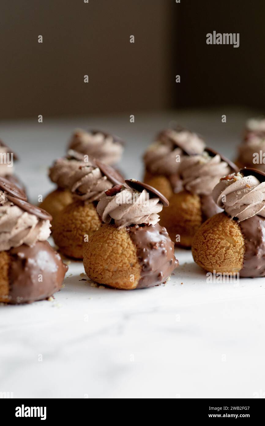 Chocolate Hazelnut Eclair Choux with chocolate frosting Stock Photo