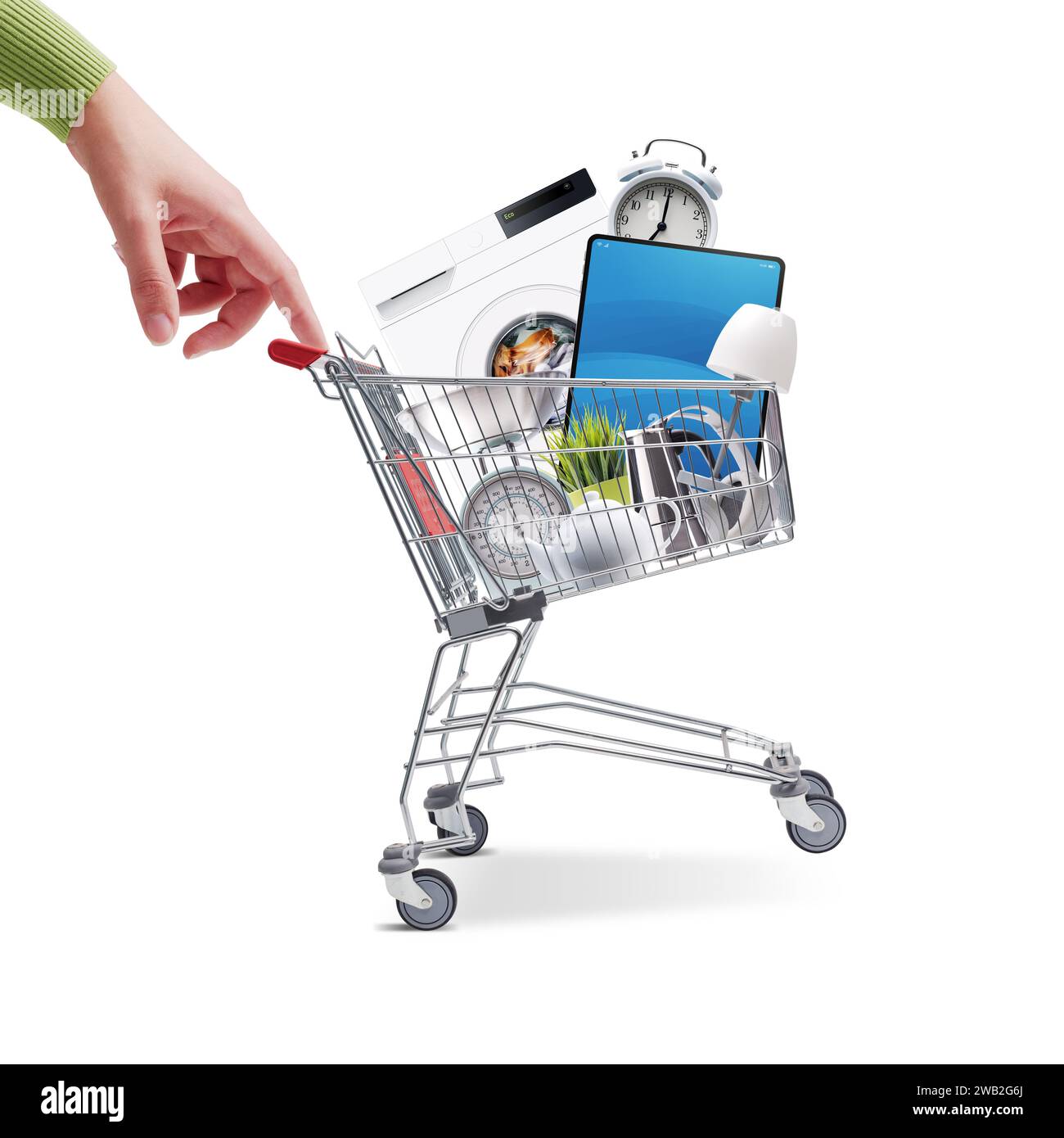 Woman pushing a small shopping cart full of household goods, appliances and electronics Stock Photo