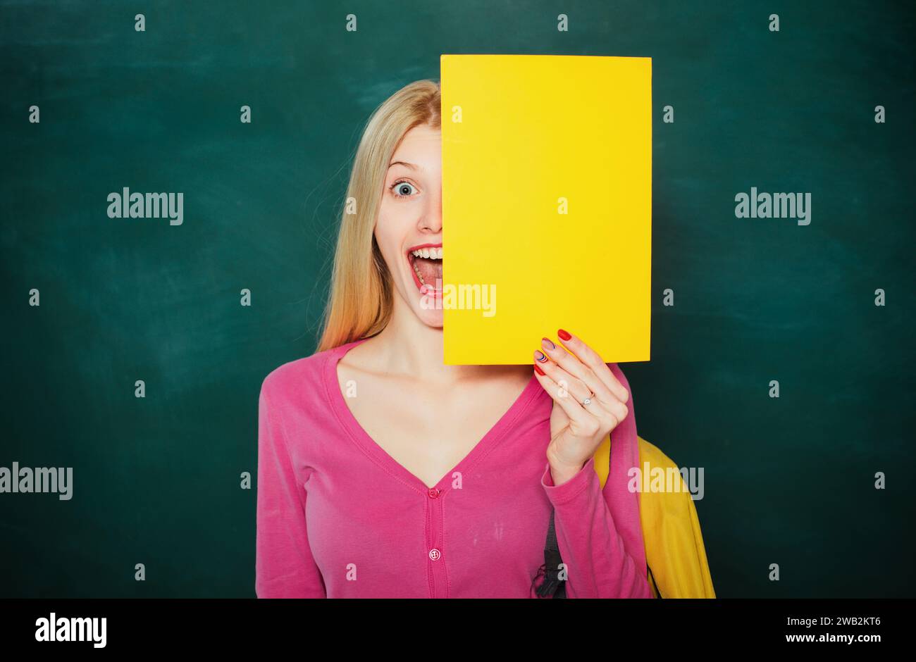 Portrait of young caucasian female teacher or student. Cheerful teacher ...