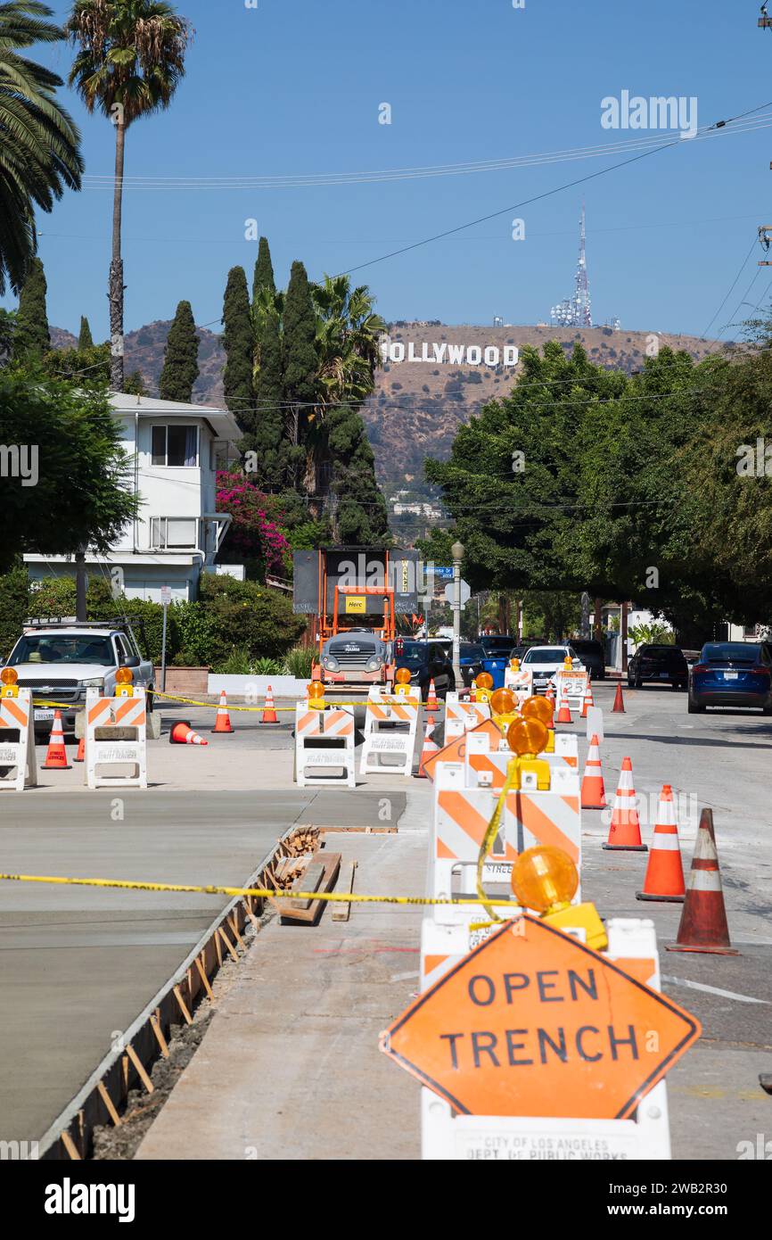 Roadworks on Beachwood Drive, Graciosa Drive inter-section, with Hollywood hills and sign. Los Angeles, California, USA Stock Photo