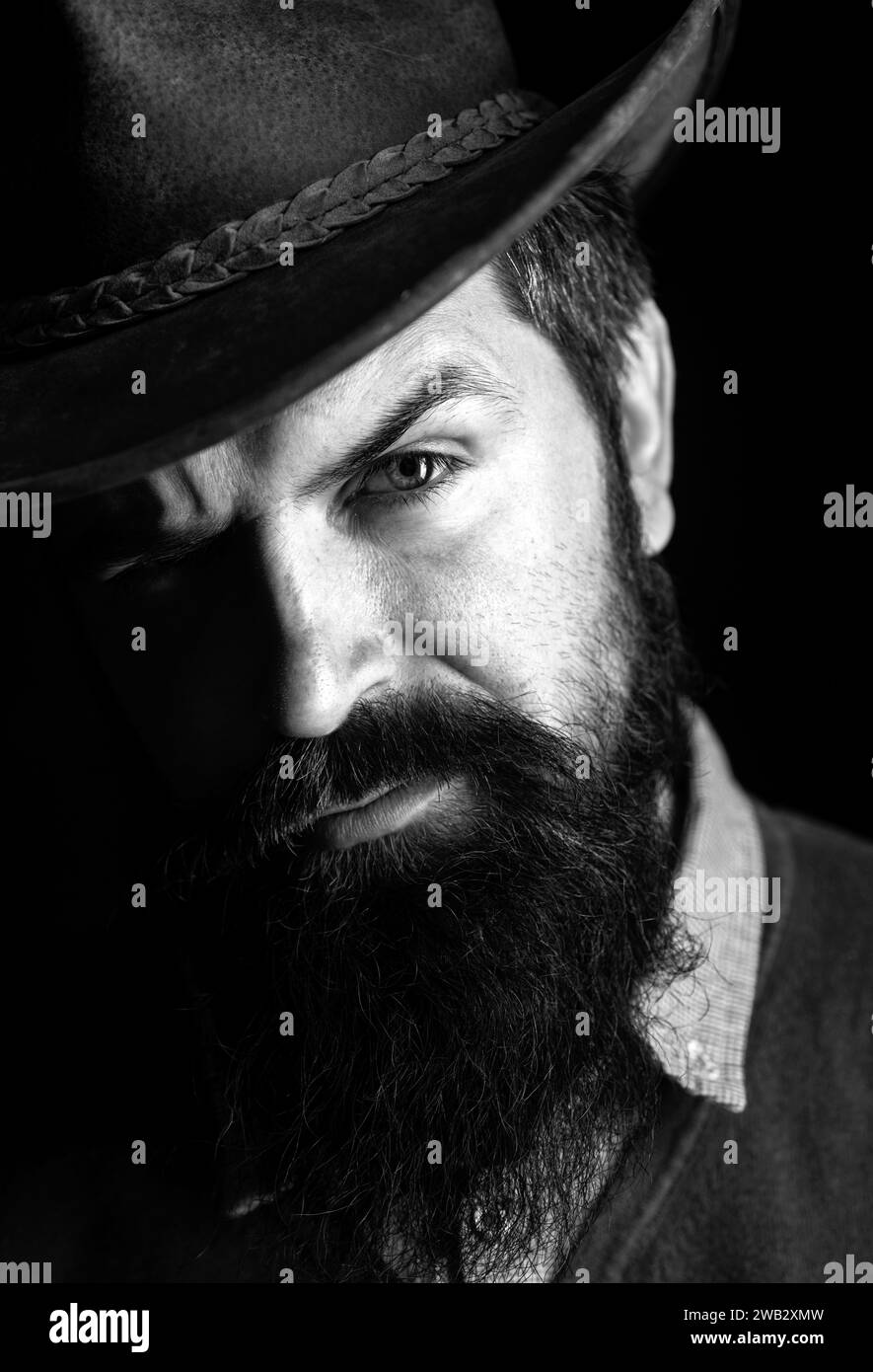Man beard in cowboy hat Black and White Stock Photos & Images - Alamy