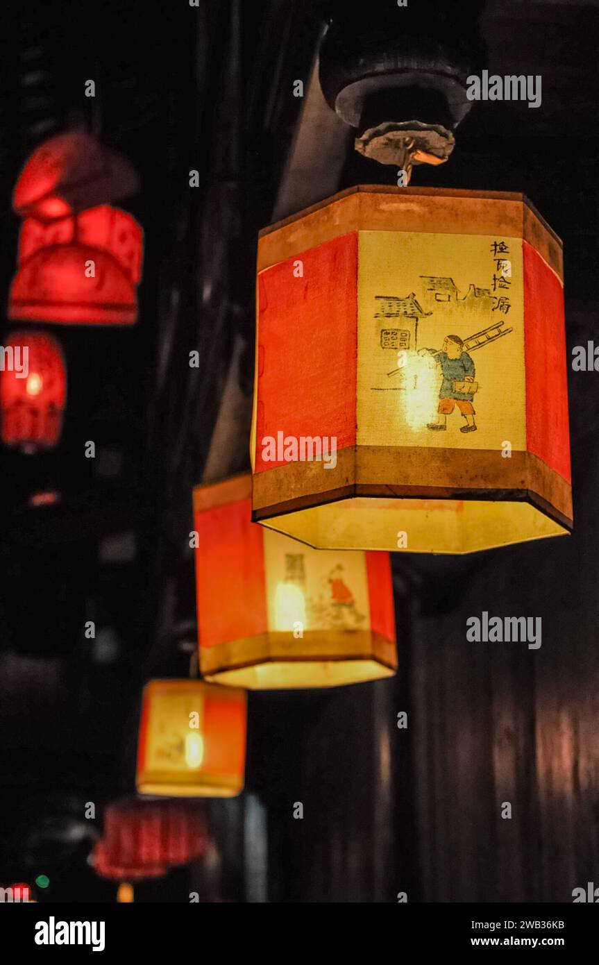 Traditional Chinesse decorative lanterns at night in Jinli street, a pedestrian street with old-world vibes. Chengdu, Sichuan, China Stock Photo