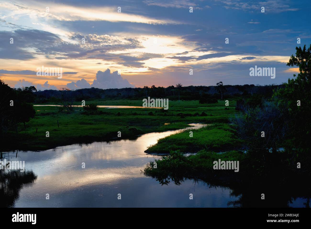 Sunset over a river, Para state, Brazil Stock Photo