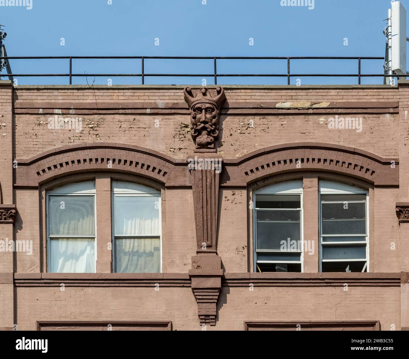 Façade detail, 1950 Third Avenue, a five-story brick mixed-use building on the corner of East 107th Street in East Harlem, aka El Barrio. Stock Photo