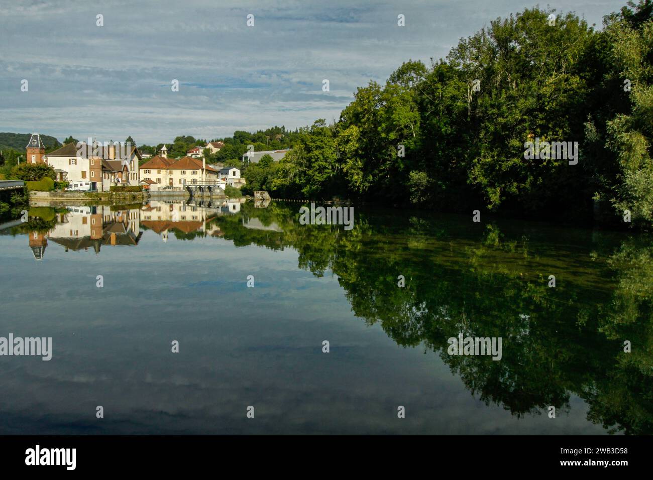 Reflexion of the sky in the waters of river La Loue, city of Ornans, Doubs department, Bourgogne-Franche-Comté region, France Stock Photo