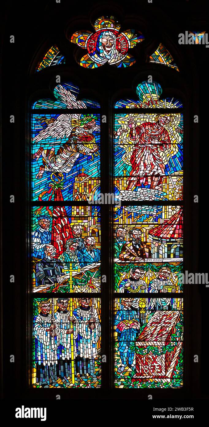 PRAGUE, CZECH REPUBLIC - FEBRUARY 19, 2015 - Stained-glass window in St Vitus Cathedral, depicting the adoration of Christ Stock Photo