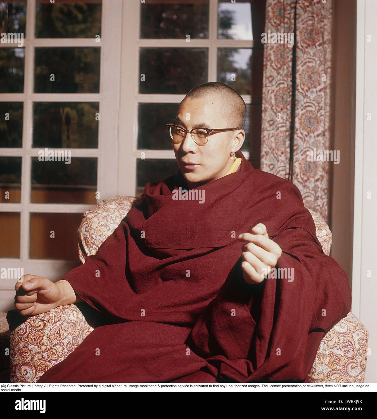 The 14th Dalai Lama. (spiritual name: Jetsun Jamphel Ngawang Lobsang Yeshe Tenzin Gyatso), also known as Tenzin Gyatso, born 6 july 1935. Known to the Tibetan people as Gyalwa Rinpoche, is, as the incumbent Dalai Lama, the highest spiritual leader and head of Tibet. ref Anders Svahn 1960. Stock Photo
