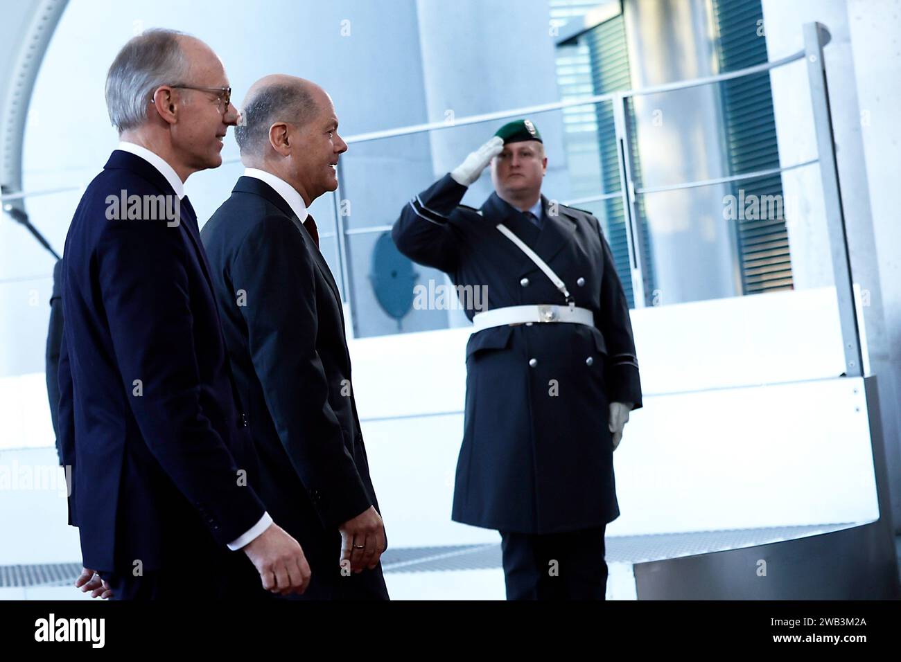 Berlin, Germany. 08th Jan, 2024. Federal Chancellor Olaf Scholz (M, SPD) receives the Prime Minister of the Grand Duchy of Luxembourg, Luc Frieden (l), in the Court of Honor at the Federal Chancellery. Credit: Carsten Koall/dpa/Alamy Live News Stock Photo