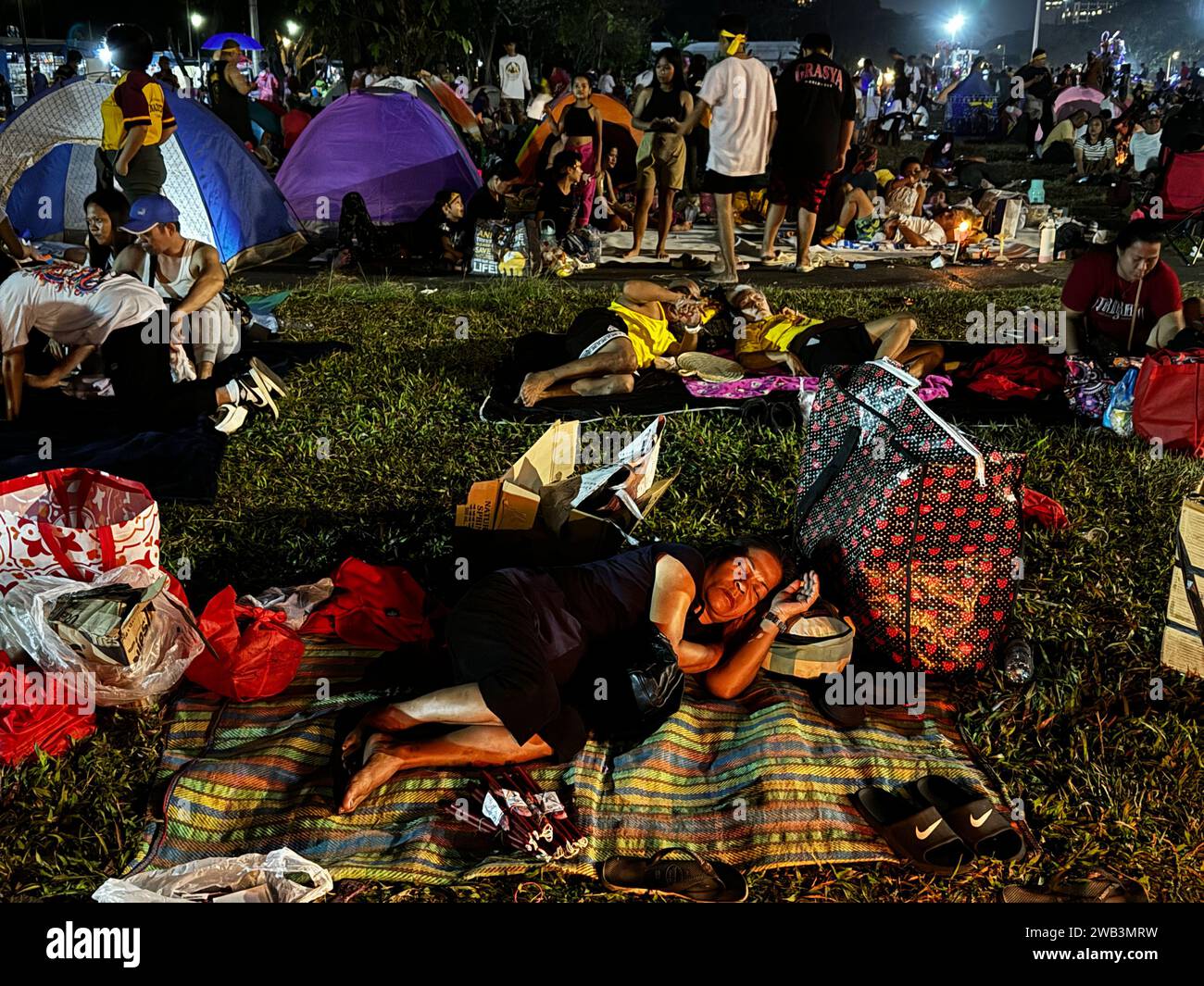 Manila Philippines 8th January 2024 Catholic Devotees Of The Black   Manila Philippines 8th January 2024 Catholic Devotees Of The Black Nazarene Continue To Flock And Camp At The Grounds Of Quirino Grandstand On The Eve Of The Feast Of Black Nazarene On January 8 2024 In Manila Philippines These Devotees Are Joining The Annual Traslacion Or The Procession Of The Black Nazarene On January 9 2024 And Hoping To Touch The Centuries Old Icon Of Jesus Christ Which Is Believed To Have Miraculous Powers Credit Image Sherbien Dacalanioalamy Live News 2WB3MRW 