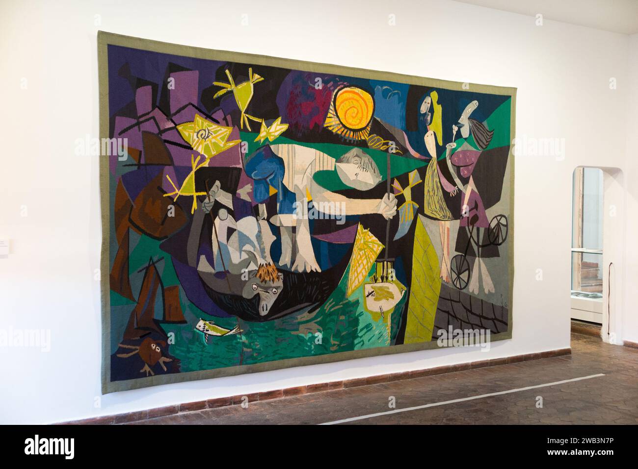 https://c8.alamy.com/comp/2WB3N7P/tapestry-picture-after-pche-de-nuit-antibes-oil-painting-picasso-art-on-display-in-muse-picasso-formerly-chteau-grimaldi-antibes-france-135-2WB3N7P.jpg