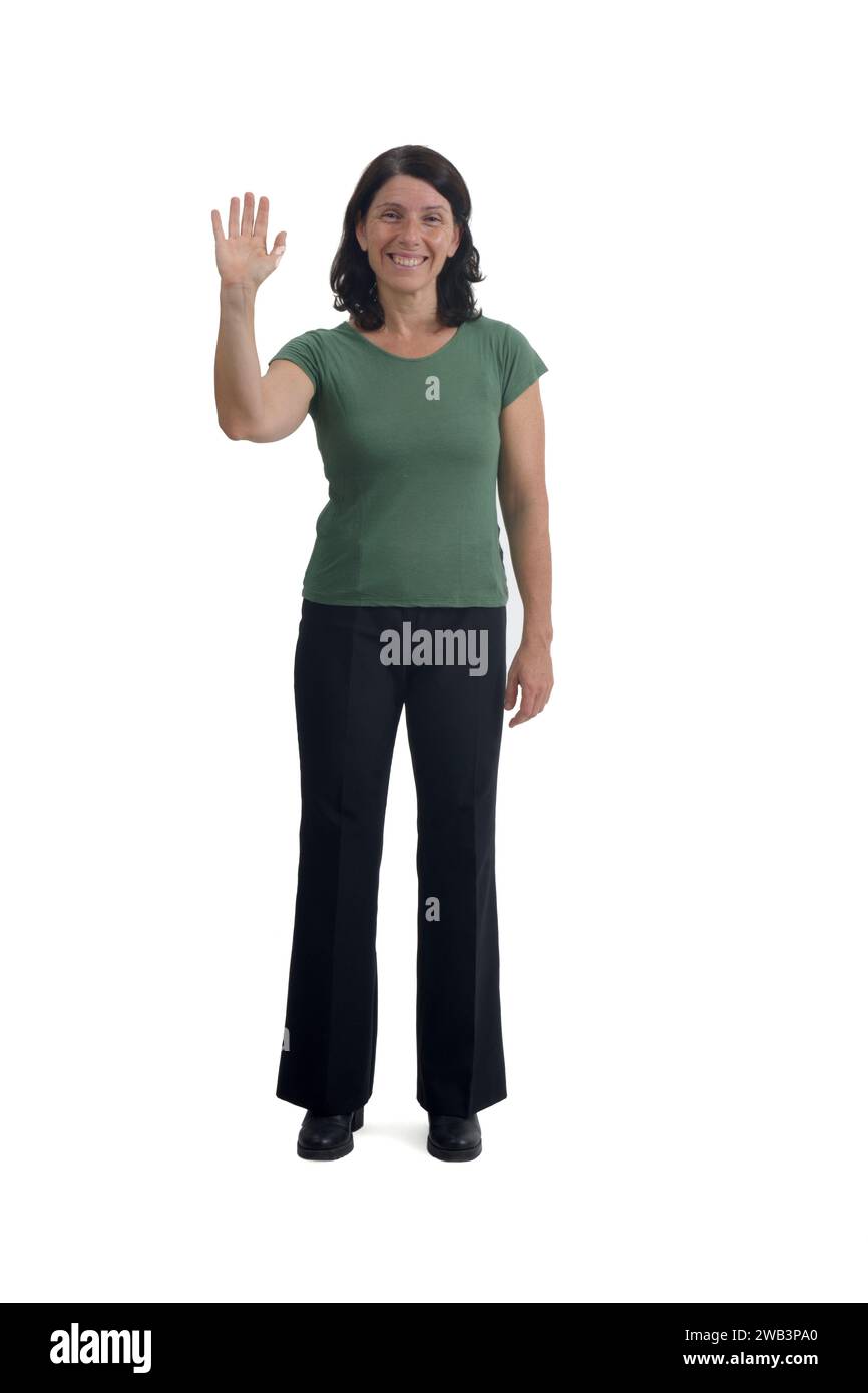 front view of a woman standing waving on white background Stock Photo