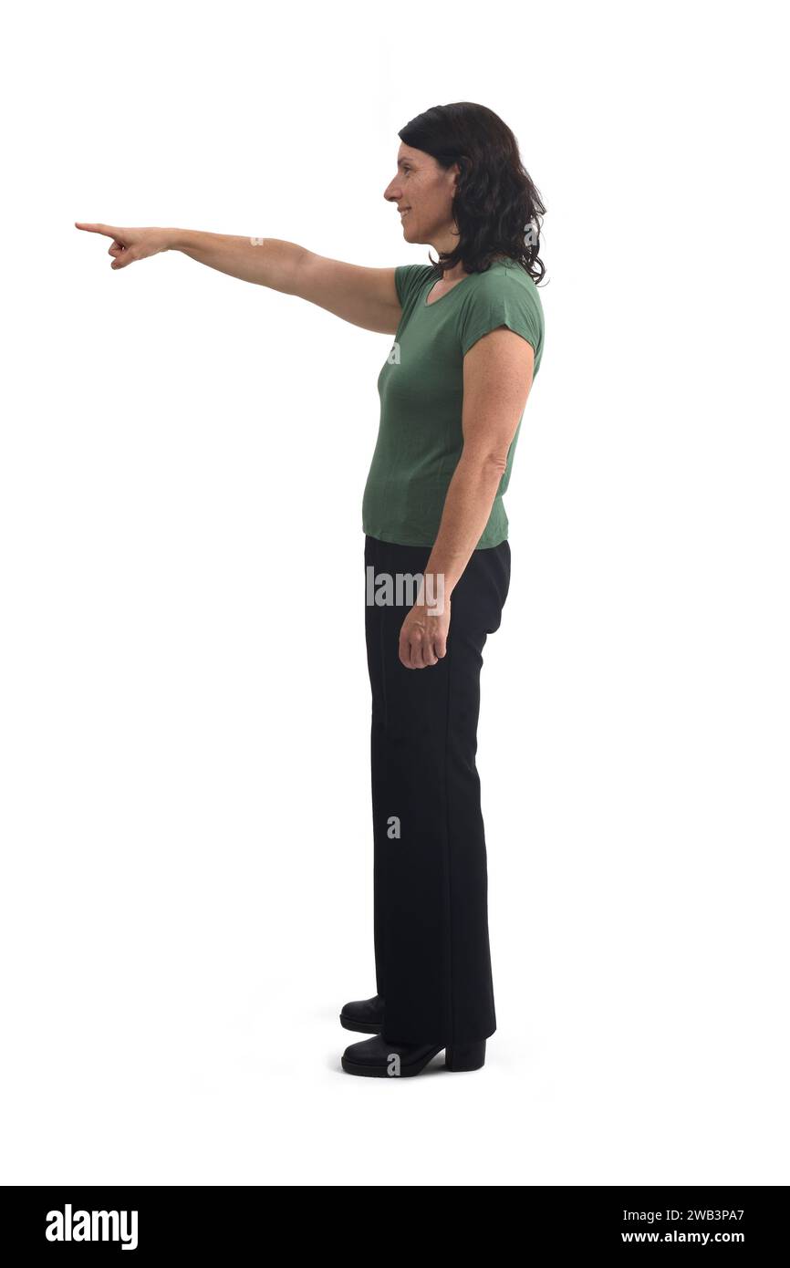 side view of a woman pointing on white background Stock Photo