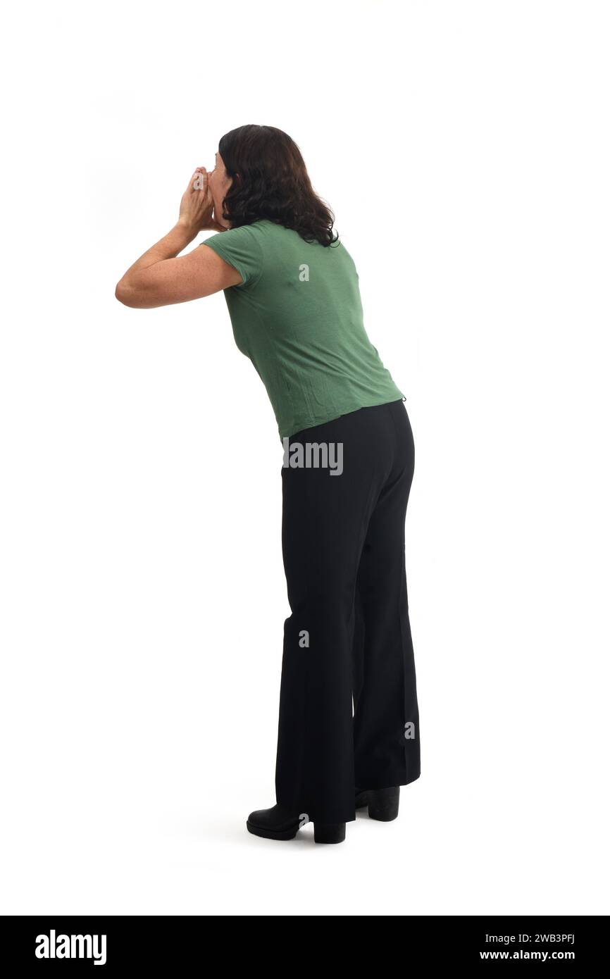 back and side view of a standing woman who is screaming on white background Stock Photo