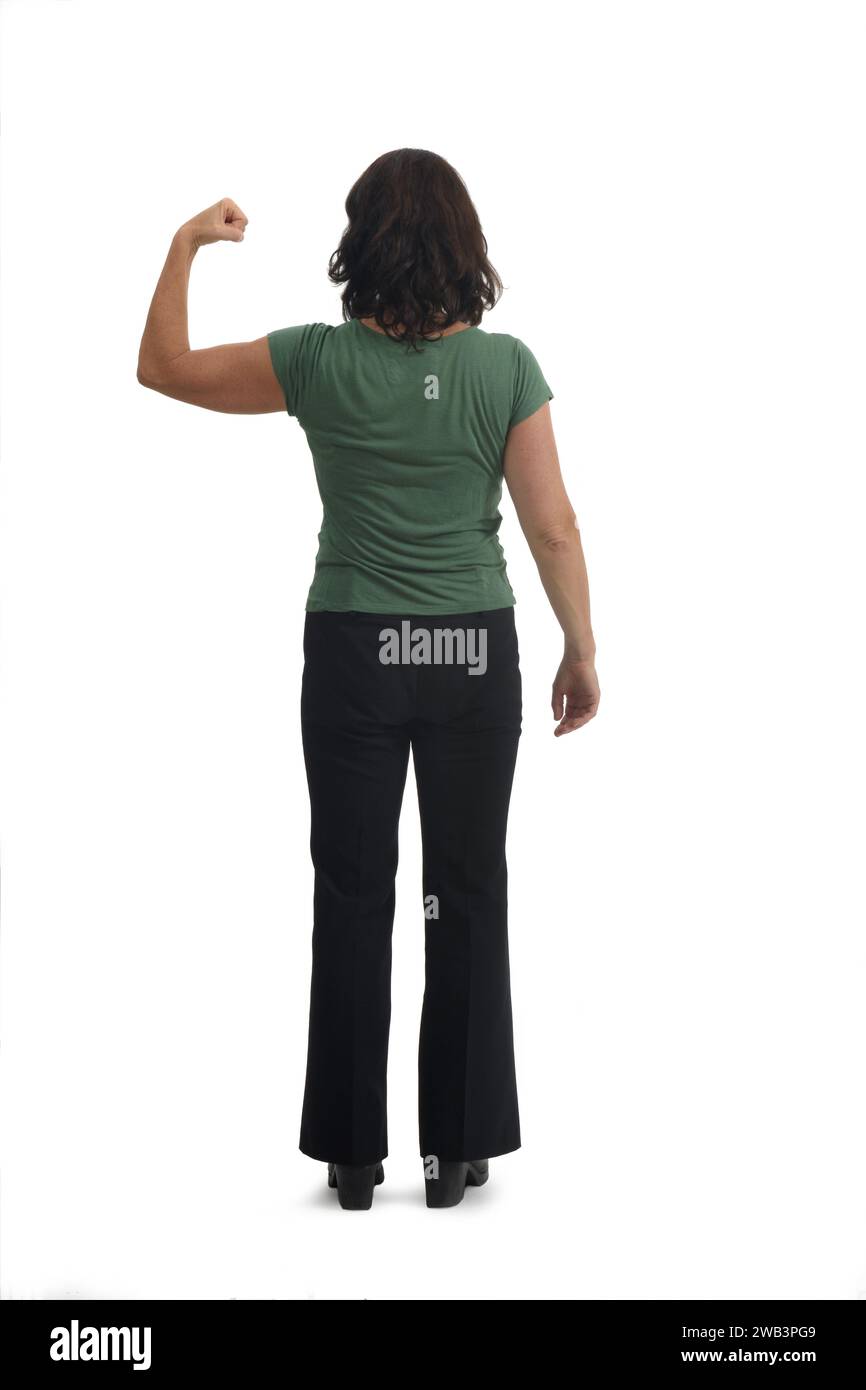 back view of a  woman showing her bicep on white background Stock Photo