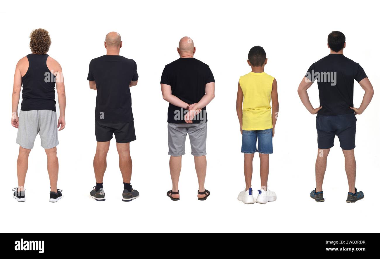 back view of a group of men wearing shorts isolated on white background. Stock Photo
