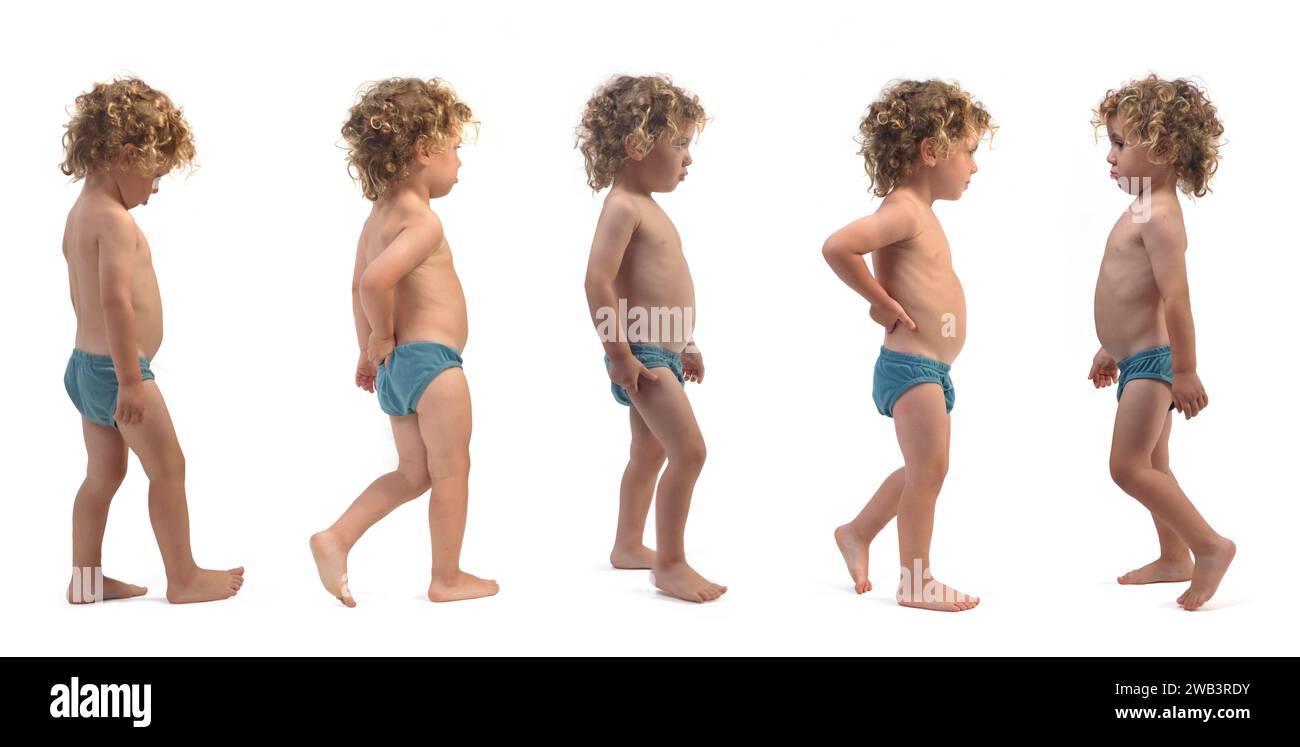 various poses of same boy in underpants walking on white background (3 year old) Stock Photo
