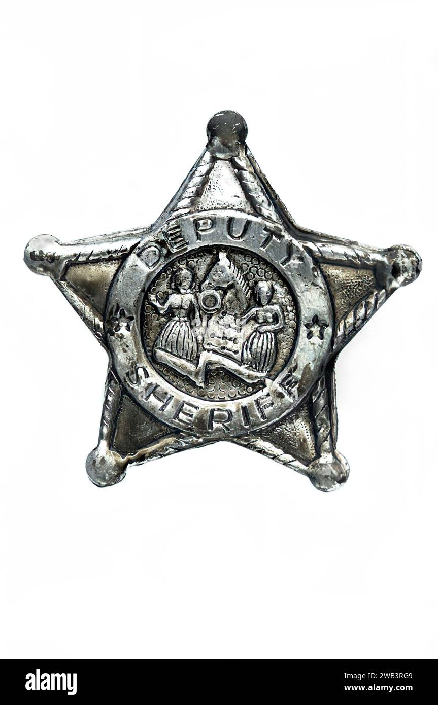 An old sheriff badge isolated on a white background Stock Photo
