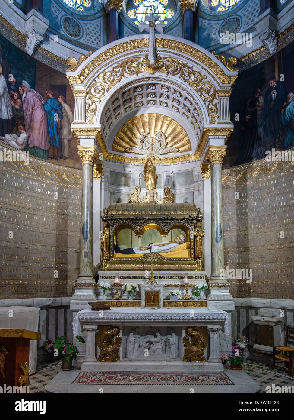 Ars sur Formans, France - October 13, 2023: The body of Saint John Mary Vianney, entombed above the main altar in the Basilica at Ars, France. The fac Stock Photo