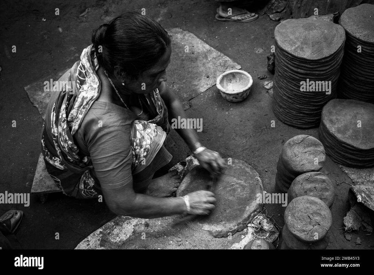 Pottery making involves shaping clay by hand, using a wheel, or coiling