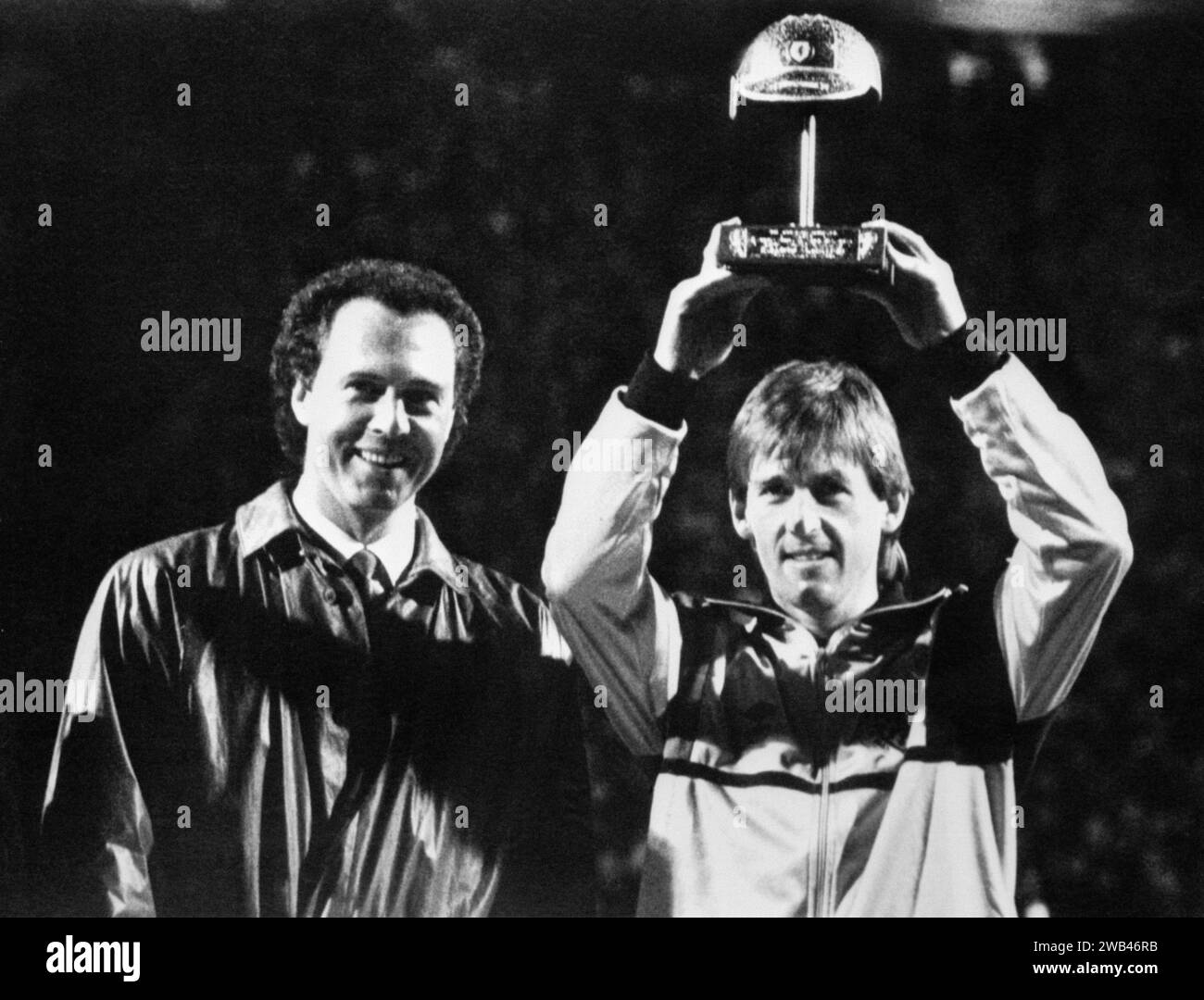 File photo dated 26-03-1986 of Franz Beckenbauer (left), who led West Germany to World Cup glory as both a captain and manager, has died at the age of 78, his family said in a statement to German news agency DPA. Issue date: Monday January 8, 2024. Stock Photo