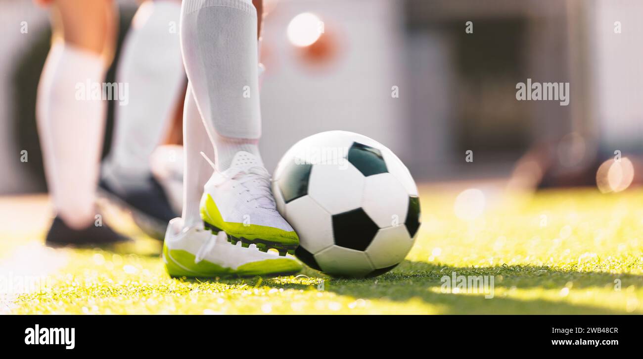 Soccer Ball in Motion Kicked by a Soccer Player. European Football