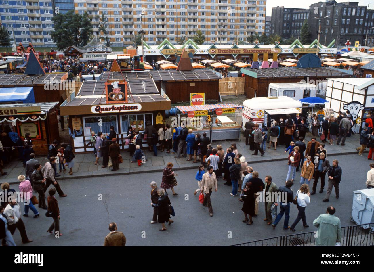 Open-air market in Dresden, East Germany: customers crowding in front of shops. 1982 Stock Photo