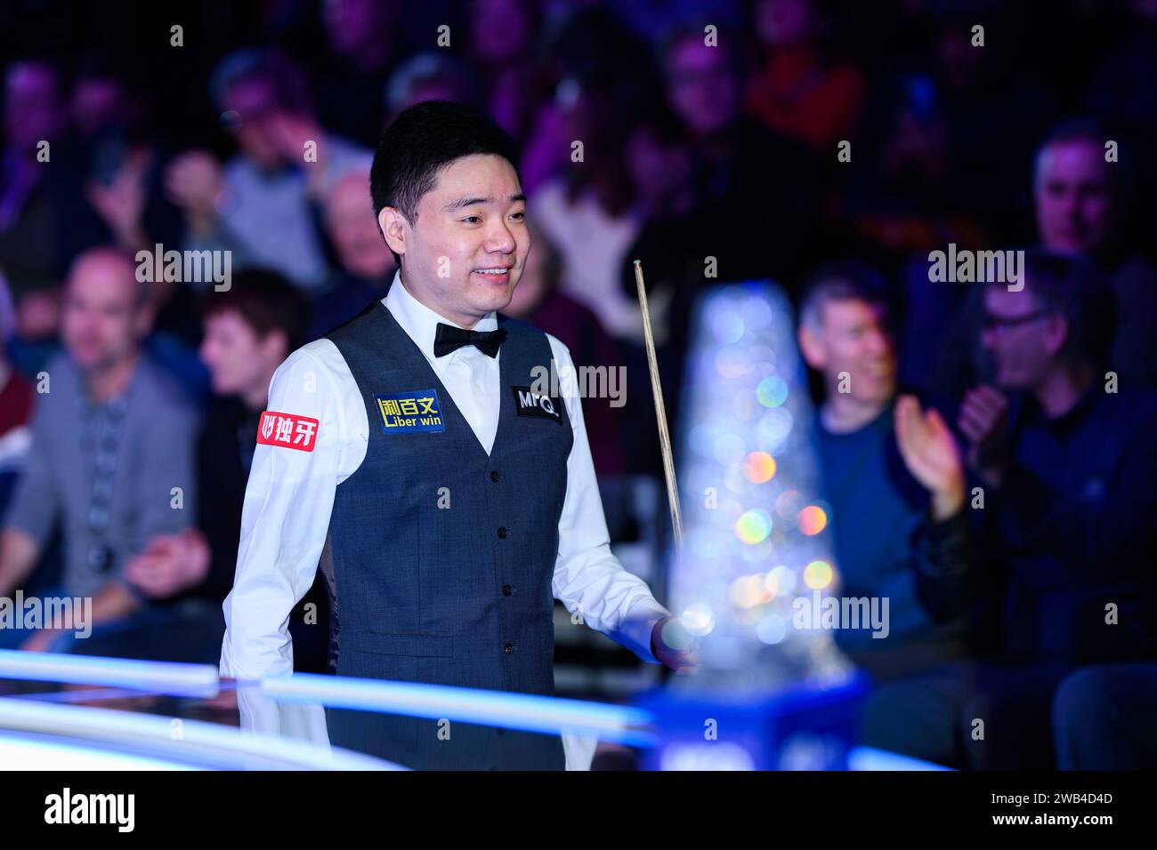 LONDON, UNITED KINGDOM. 08th Jan, 2024. Ding Junhui enters the arena in day 2 match between Ronnie O’Sullivan Ding Junhui during the 2024 MrQ Masters at Alexandra Palace on Monday, January 08, 2024 in LONDON ENGLAND. Credit: Taka G Wu/Alamy Live News Stock Photo