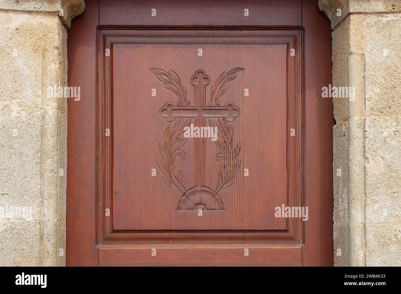 sculpted door of a church in an orthodox monastery (chrysoskalitissas) in crete in greece Stock Photo