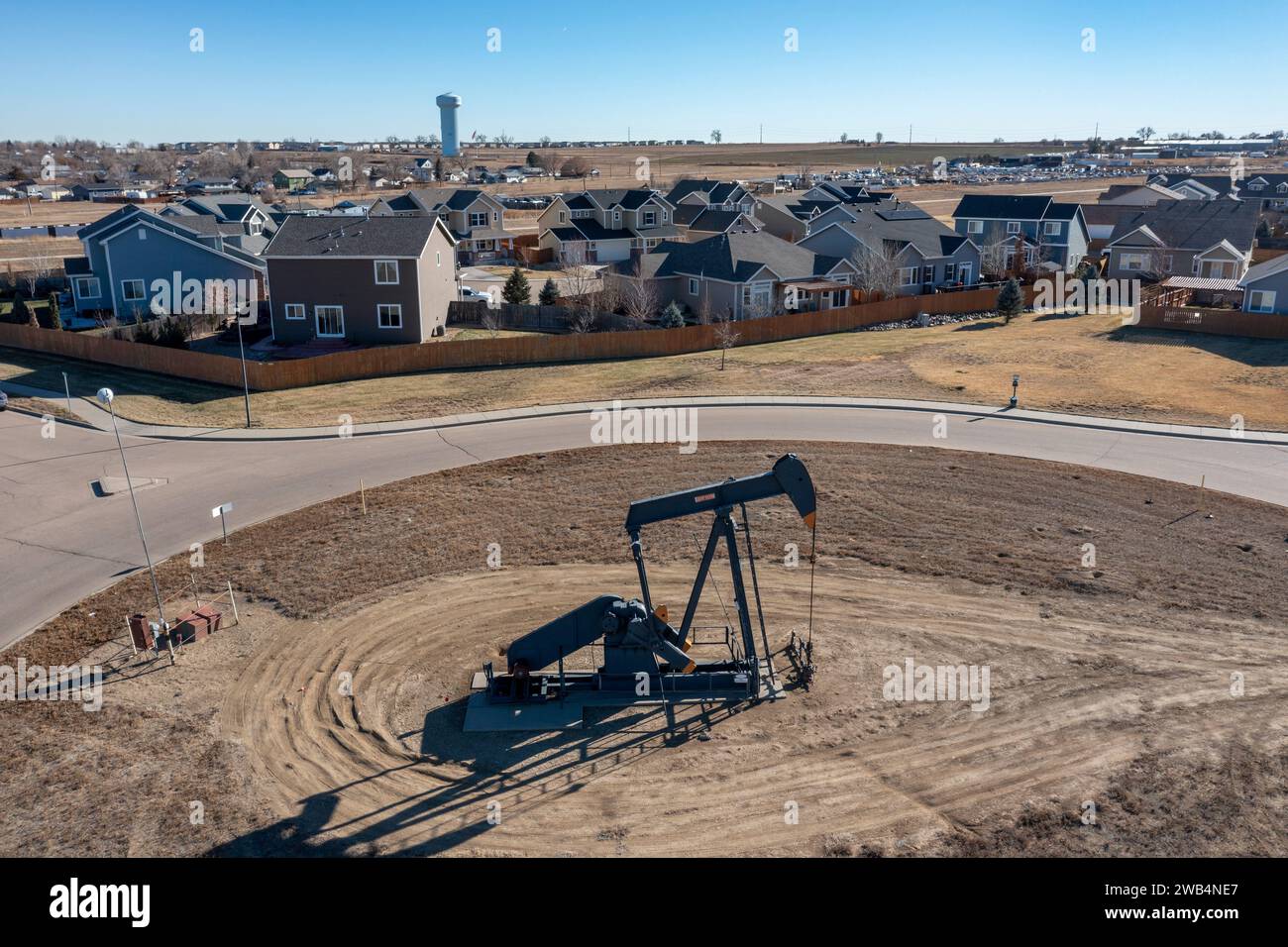Frederick, Colorado - An oil well near a housing subdivision on Colorado's front range. Stock Photo