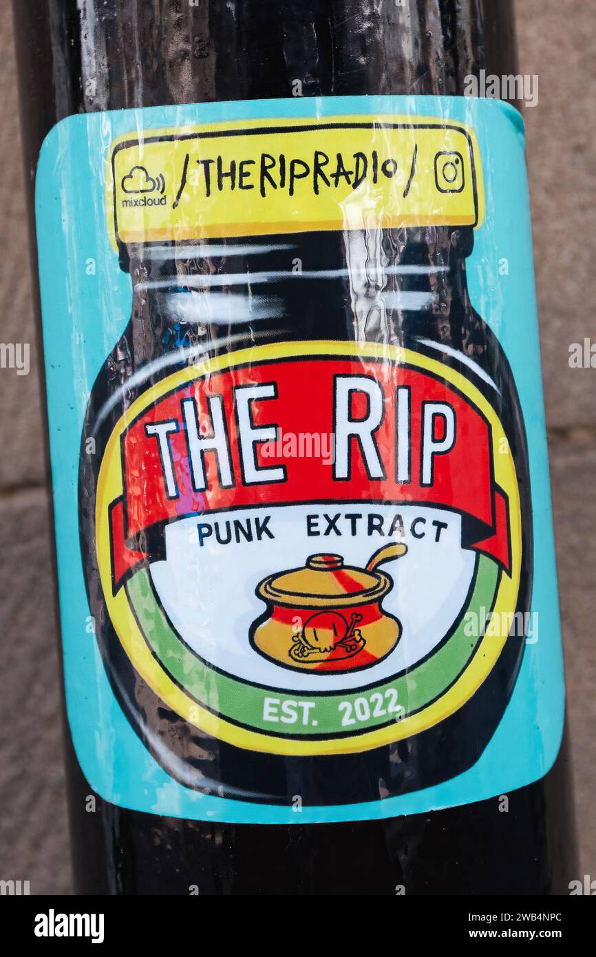 Advert on drain pipe in Windermere Village The Rip · The best Punk / Ska / Hardcore, on Lake District Radio! · Live Every Wednesday 9pm - 11pm Stock Photo