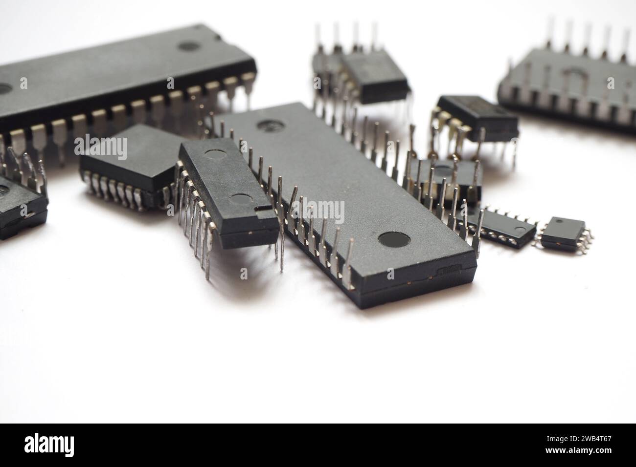 Various analog integrated circuit (ICs) elements. Semiconductor industry header. Stock Photo