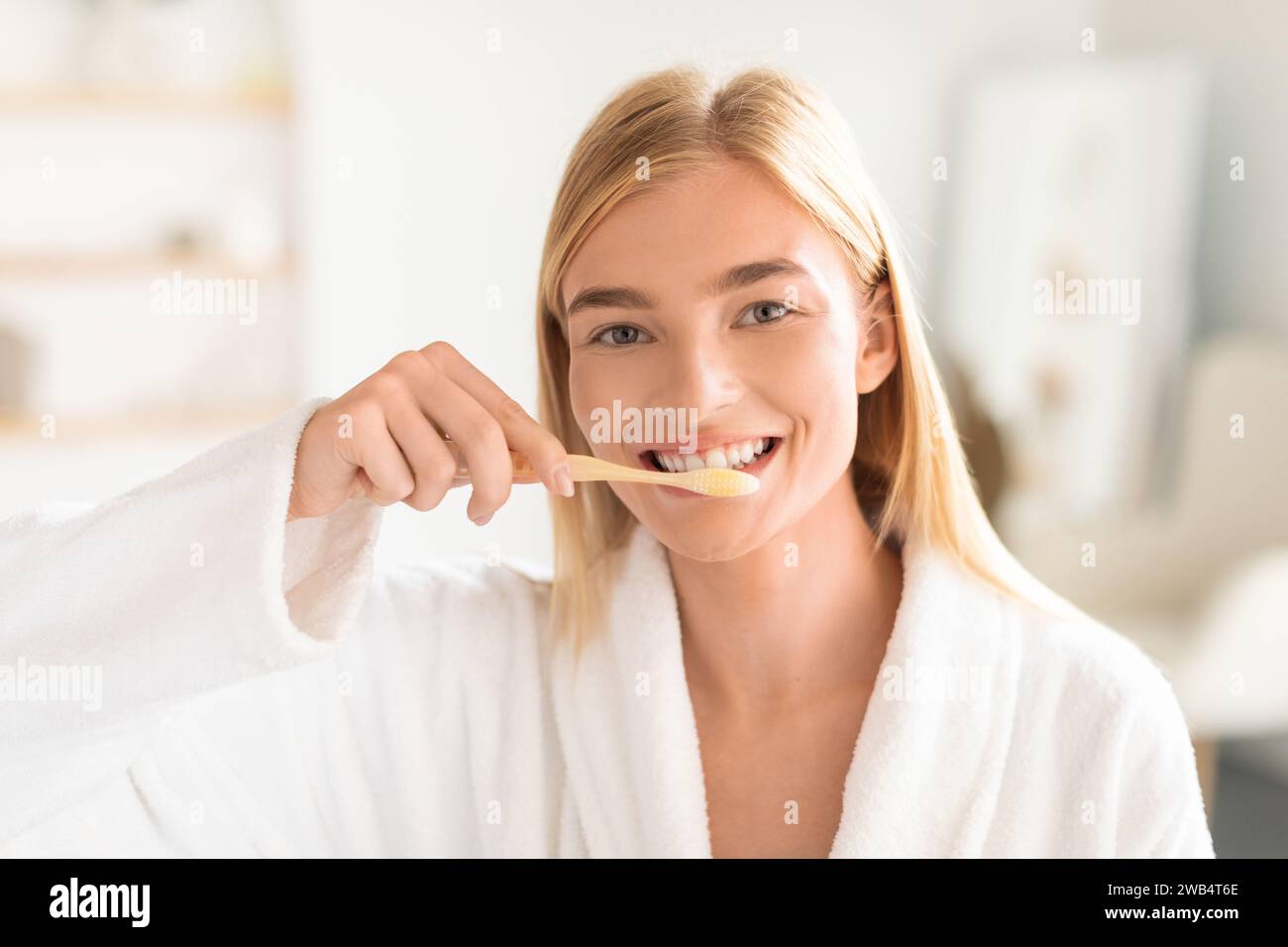 Lady in bathrobe brushes hi-res stock photography and images - Alamy