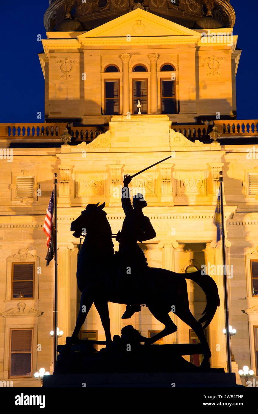 Thomas Francis Meagher statue with capitol at night, Montana State ...