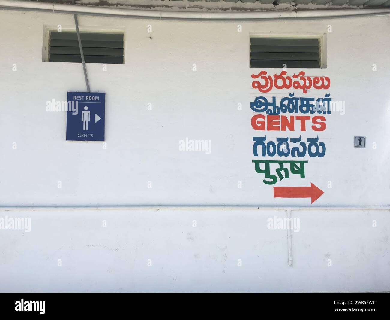 Gents Toilet signage in multiple languages in India. Washroom signs and