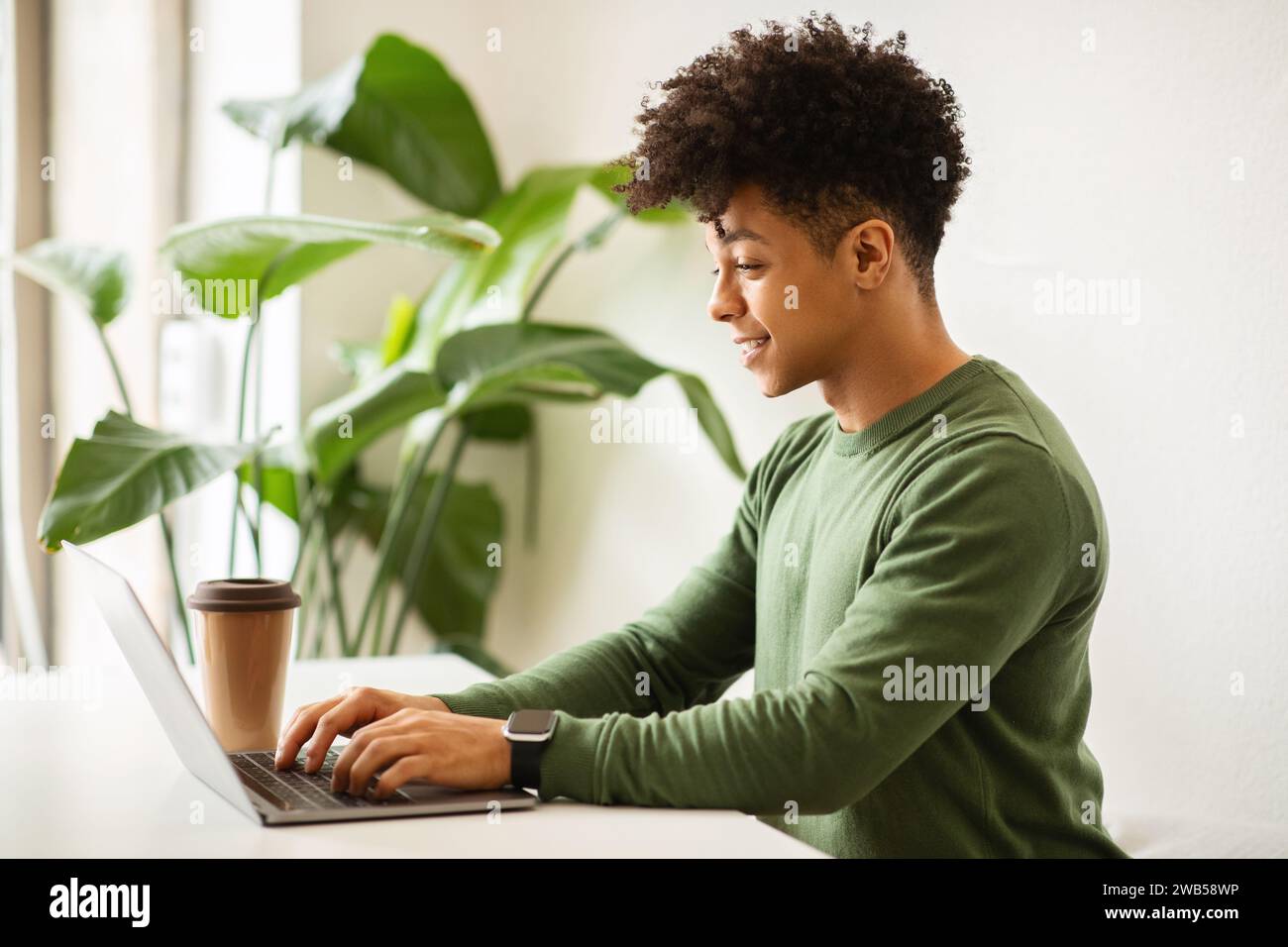Independent contractor at remote work, digital nomad at workplace Stock Photo