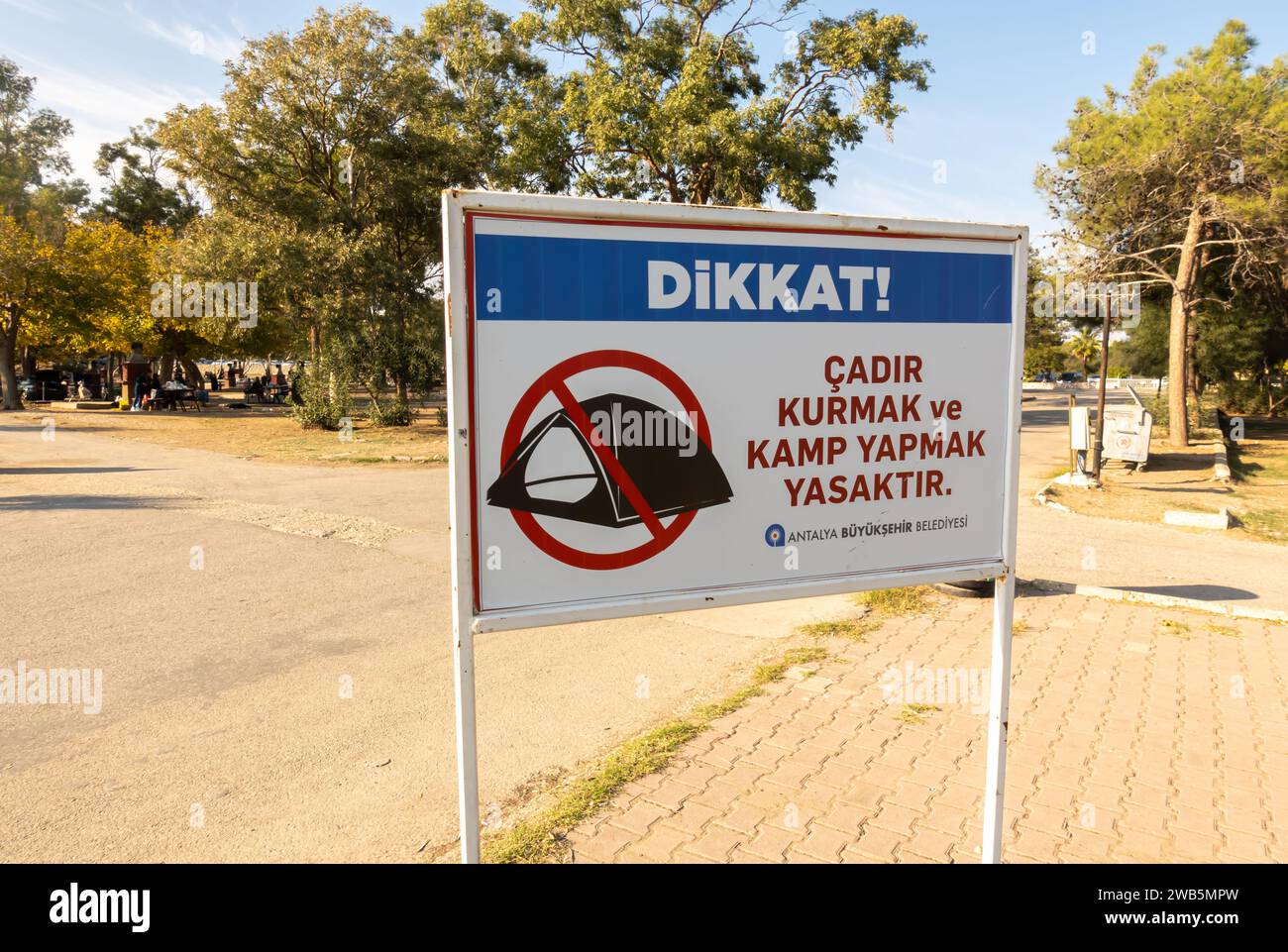 Sign prohibiting camping putting a tent on Lara beach Antalya Turkey Stock Photo