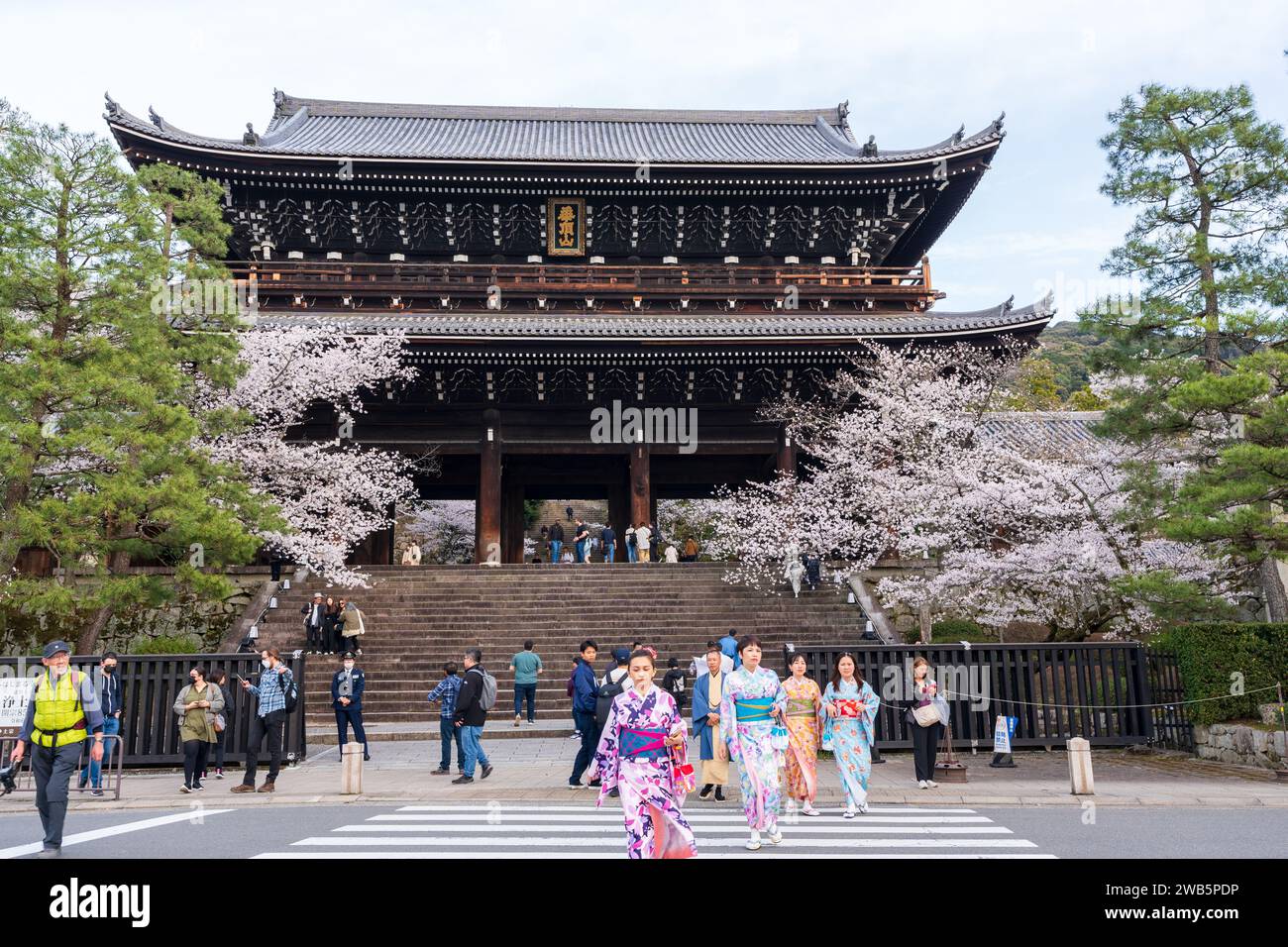 Kyoto, Japan - March 27 2023 : Chionin Temple Sanmon Gate. Cherry blossom. Stock Photo