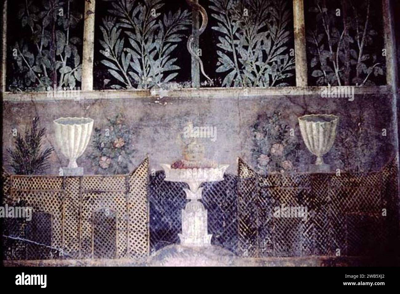 1.9.5 Pompeii. 1966. Room 11, east wall of cubiculum with detail of garden trellis painting.. Stock Photo