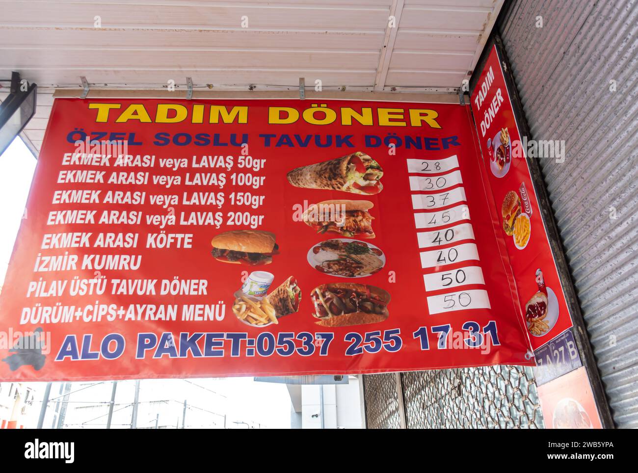 Tadim doner menu in Turkish, lavash doner kebap kebab menu prices pricing Antalya Turkey Stock Photo