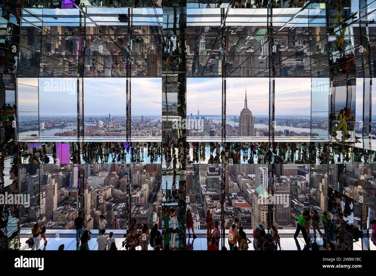Tourists and visitors enjoying the mirrored observation deck at Summit One Vanderbilt in New York, USA. Stock Photo