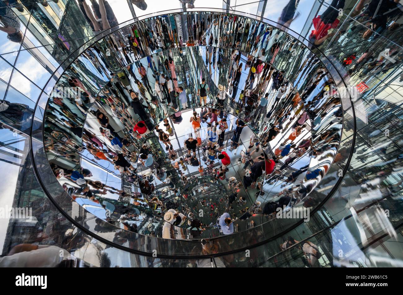 Tourists and visitors enjoying the mirrored observation deck at Summit One Vanderbilt in New York, USA. Stock Photo