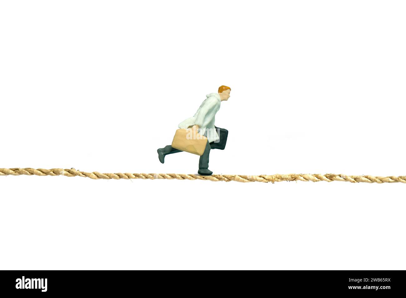 Miniature people toy figure photography. A businessman wearing coat ...