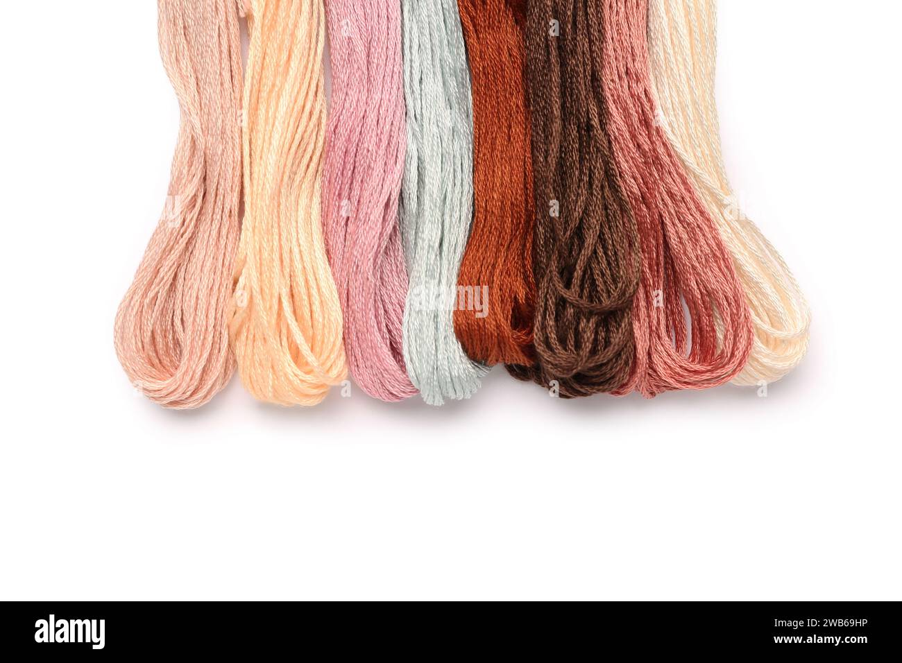 Different mouline threads isolated on white background Stock Photo - Alamy