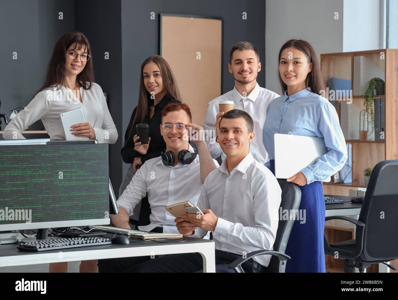 Team of young programmers working in office Stock Photo