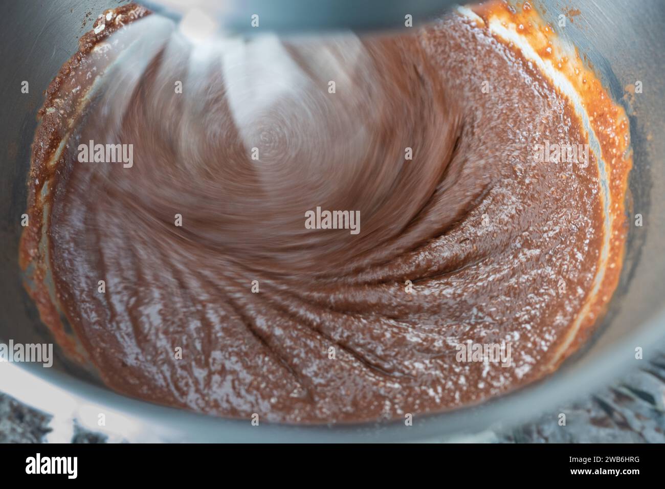 Standing mixer blending brownie mix Stock Photo Alamy