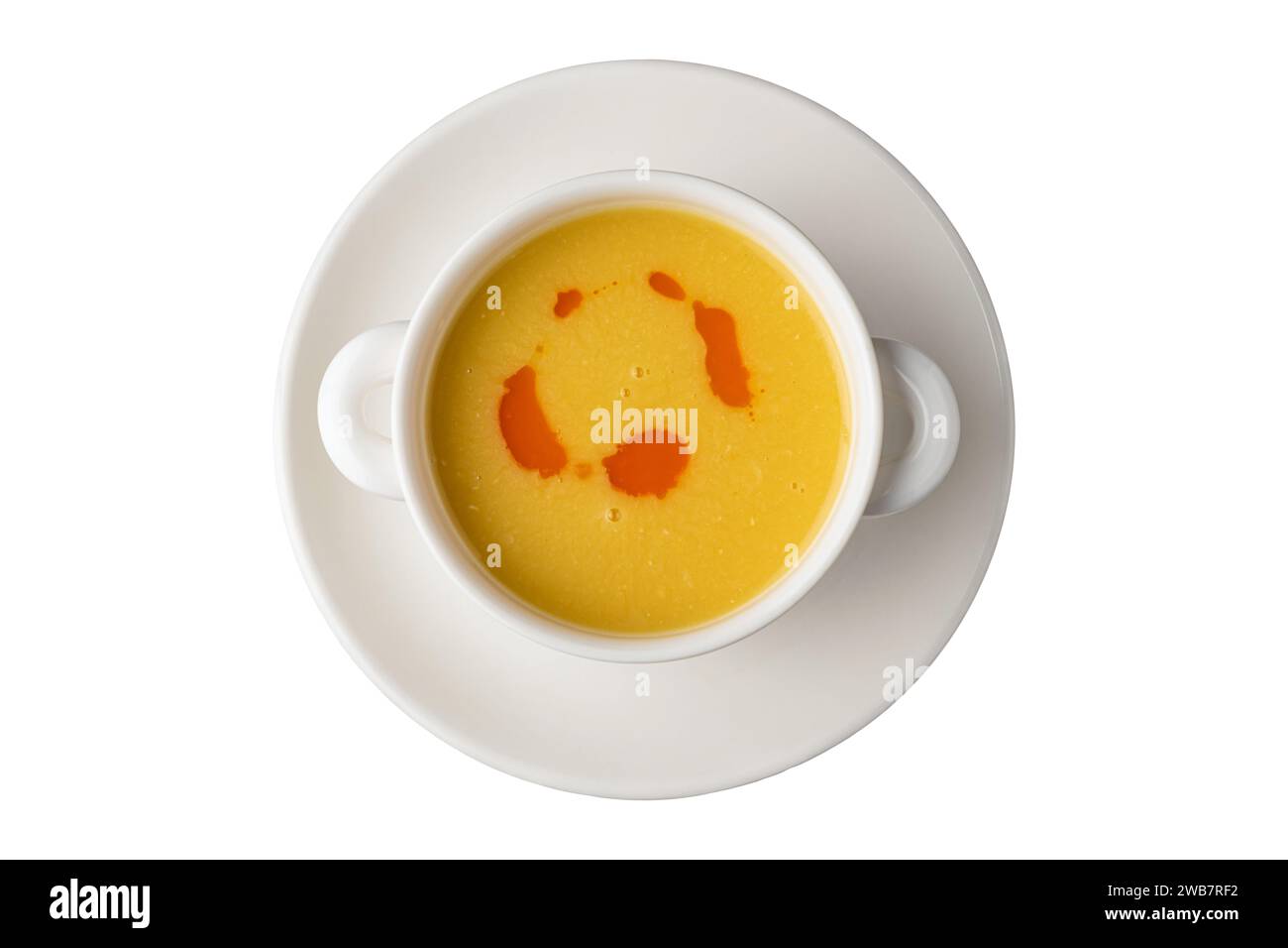Strained lentil soup on a white porcelain plate Stock Photo