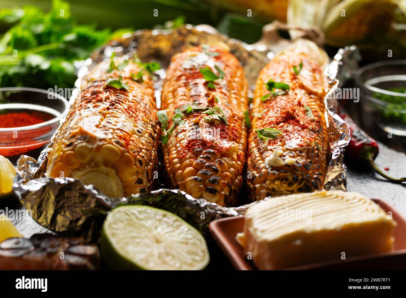 Grilled Sweetcorn with smoked paprika lime and butter in tin foil on