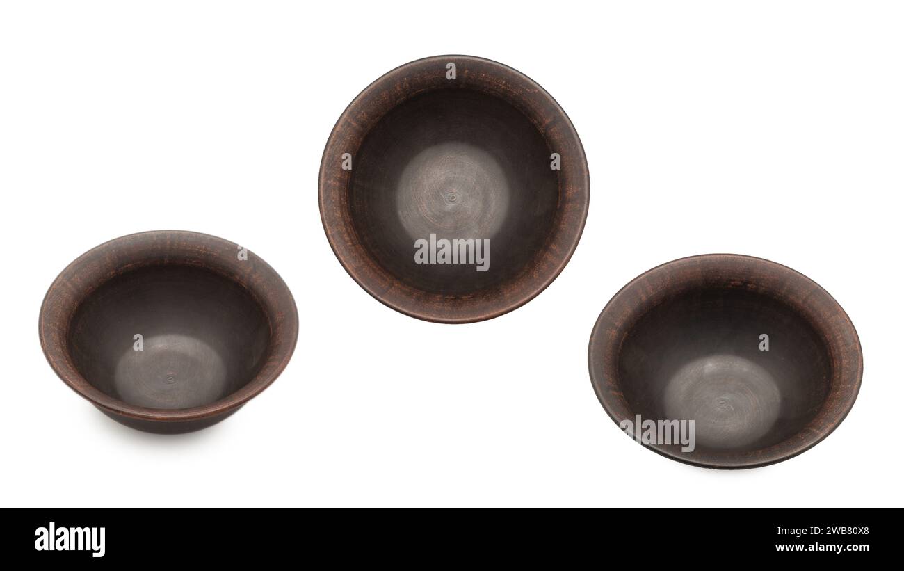 Ceramic empty brown bowl isolated on white background. Stock Photo